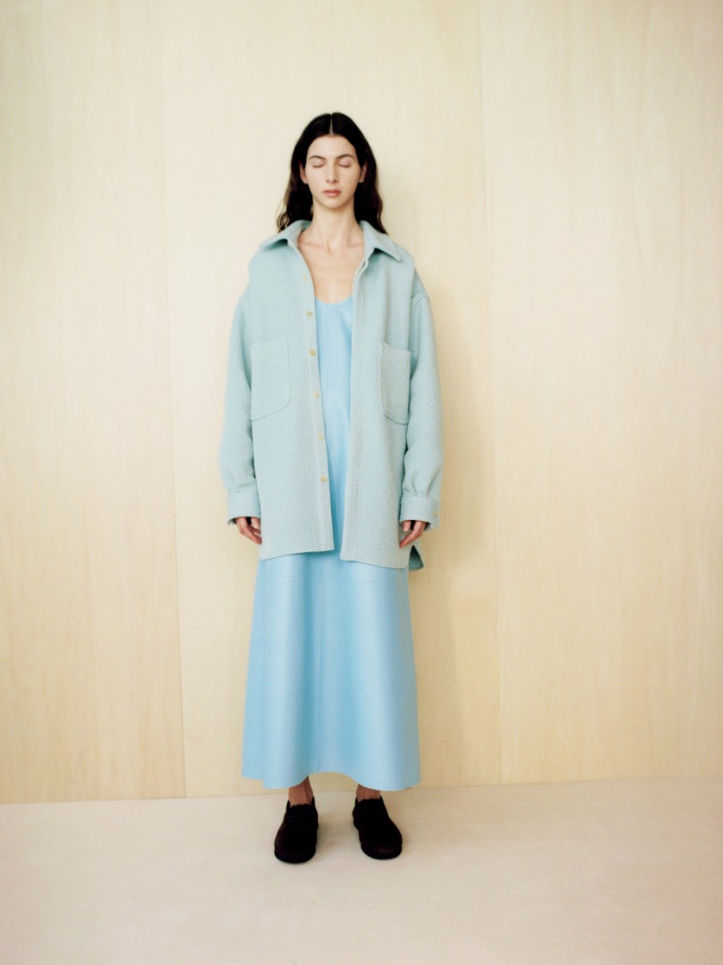 Tiger wears Shetland Wool Organic Cotton Woven Cloth Shirts Blouson in Light Blue, Light Lamb Leather Dress in Light Blue