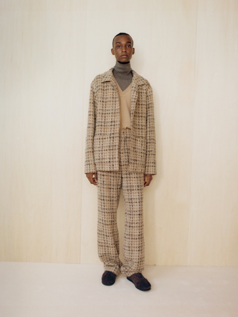 Mohamed wears Homespun Tweed Shirts Blouson in Beige Tweed, Homespun Tweed Slacks in Beige Tweed