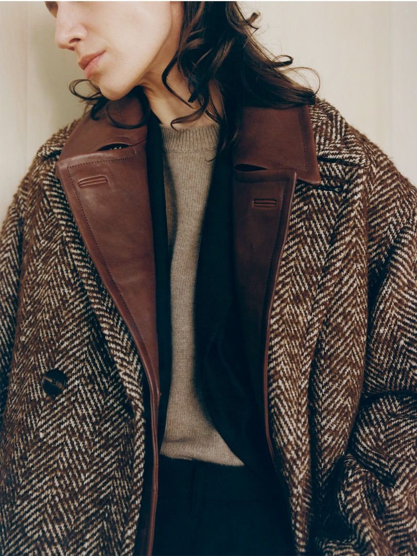 Ella wears Wool Alpaca Herringbone Tweed Double Coat in Brown Herringbone, Heavy Lamb Leather Coat in Brown