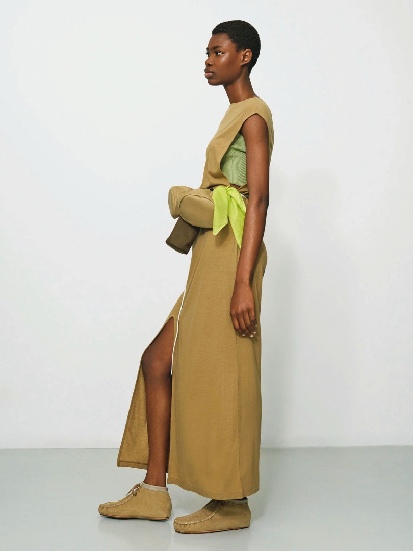 Elvina wears Super Soft Wool Jersey Dress in Khaki Beige, Pouch Set Made By Aeta in Dark Brown