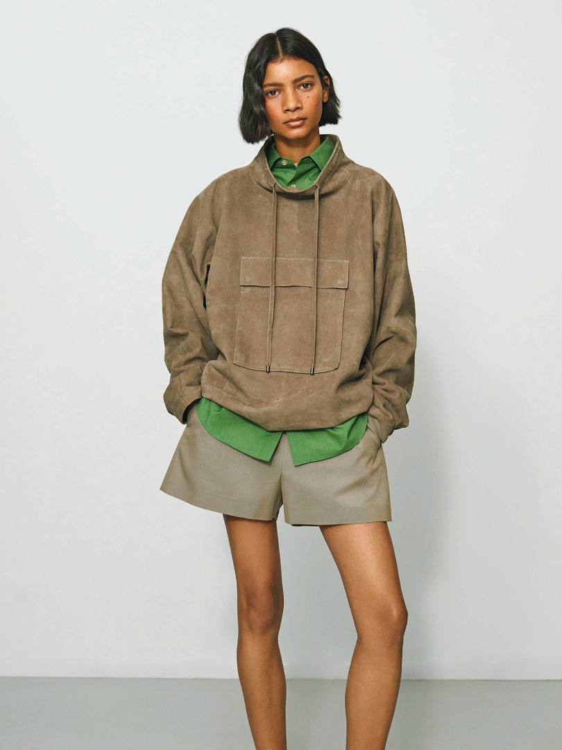 Thais wears Goat Suede P/O Blouson in Khaki Beige